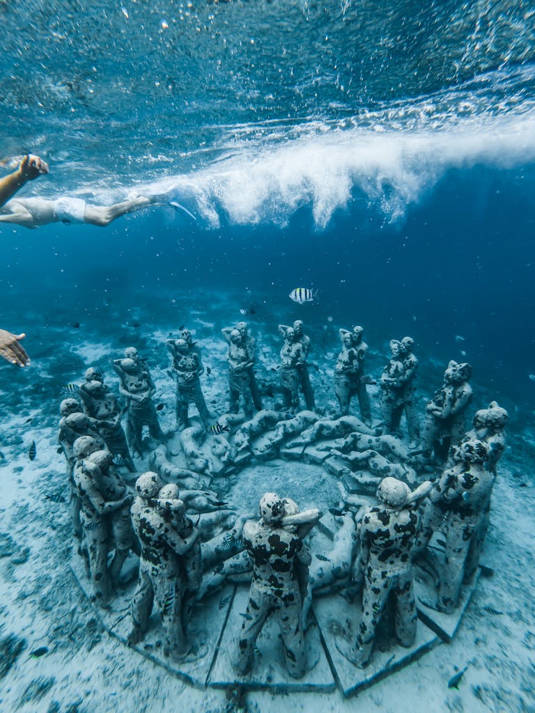 Submerged sculptures in Nusa Tenggara's vibrant sea when sailing in Indonesia, perfect for underwater exploration.