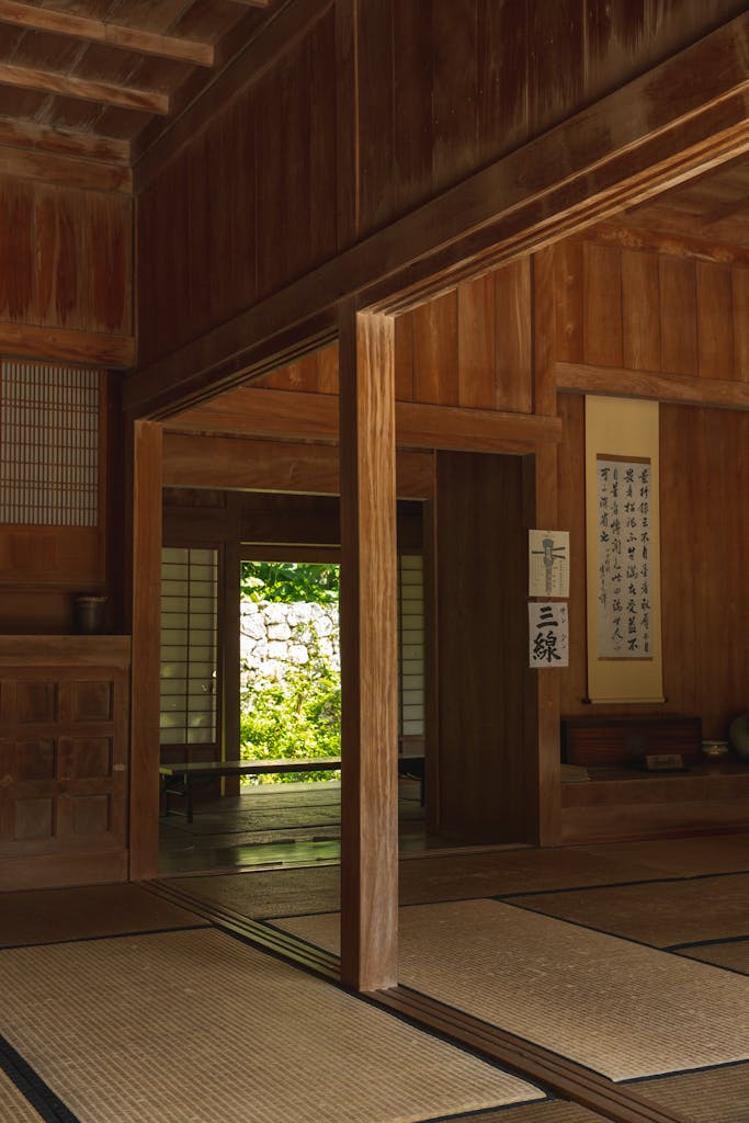 A cozy, minimalist traditional Japanese room with tatami mats and wooden elements, conveying cultural essence.