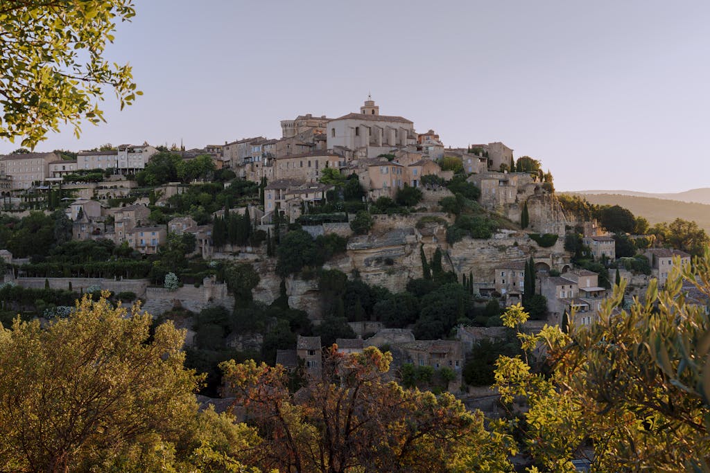 Explore the picturesque landscape of Gordes village in the Provence-Alpes-Côte d'Azur region of France.