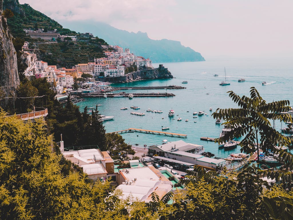 Breathtaking view of Amalfi's picturesque harbor and coastline, perfect for travel inspiration.